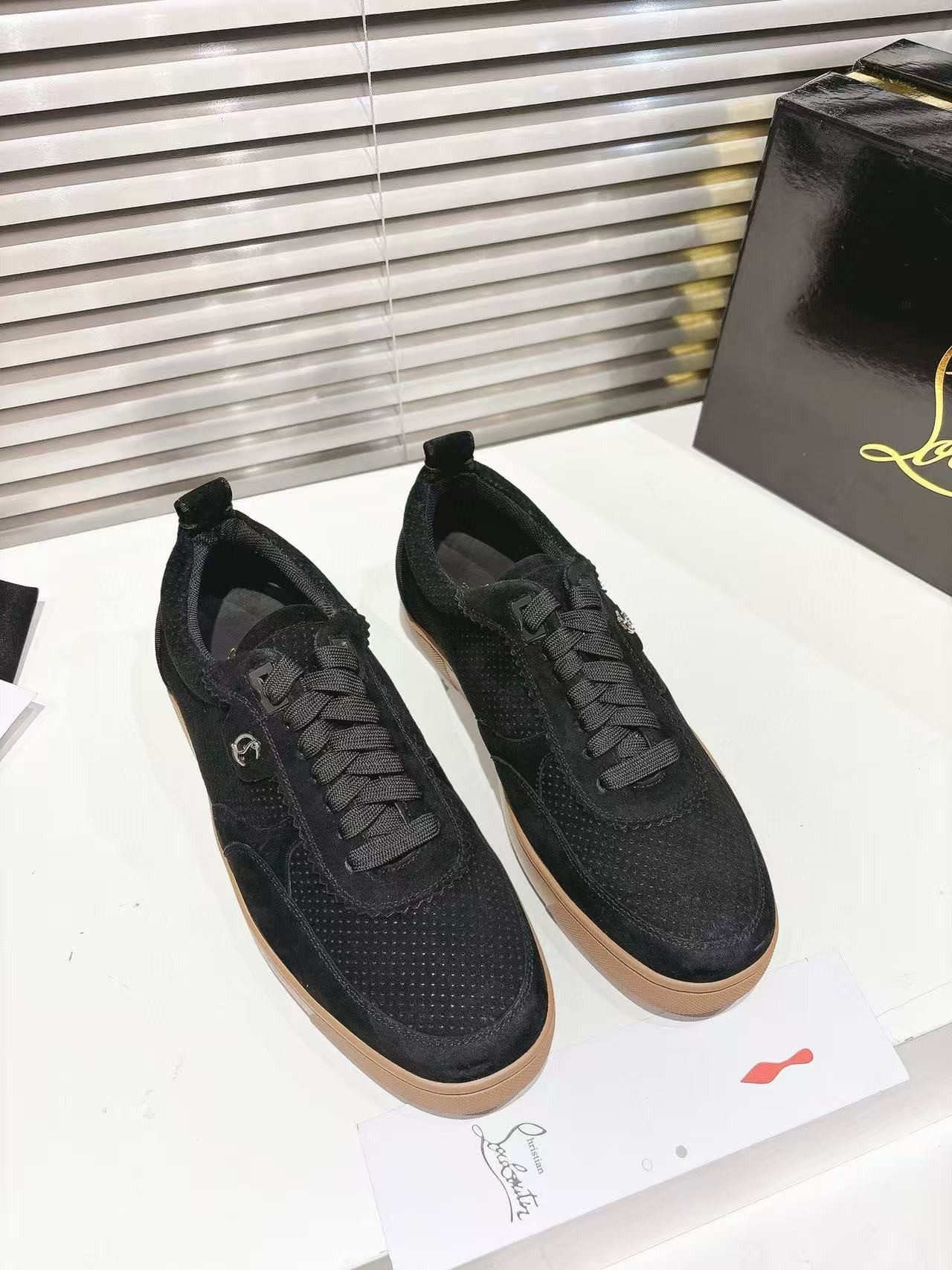 ua Ch**an louboutin sneaker