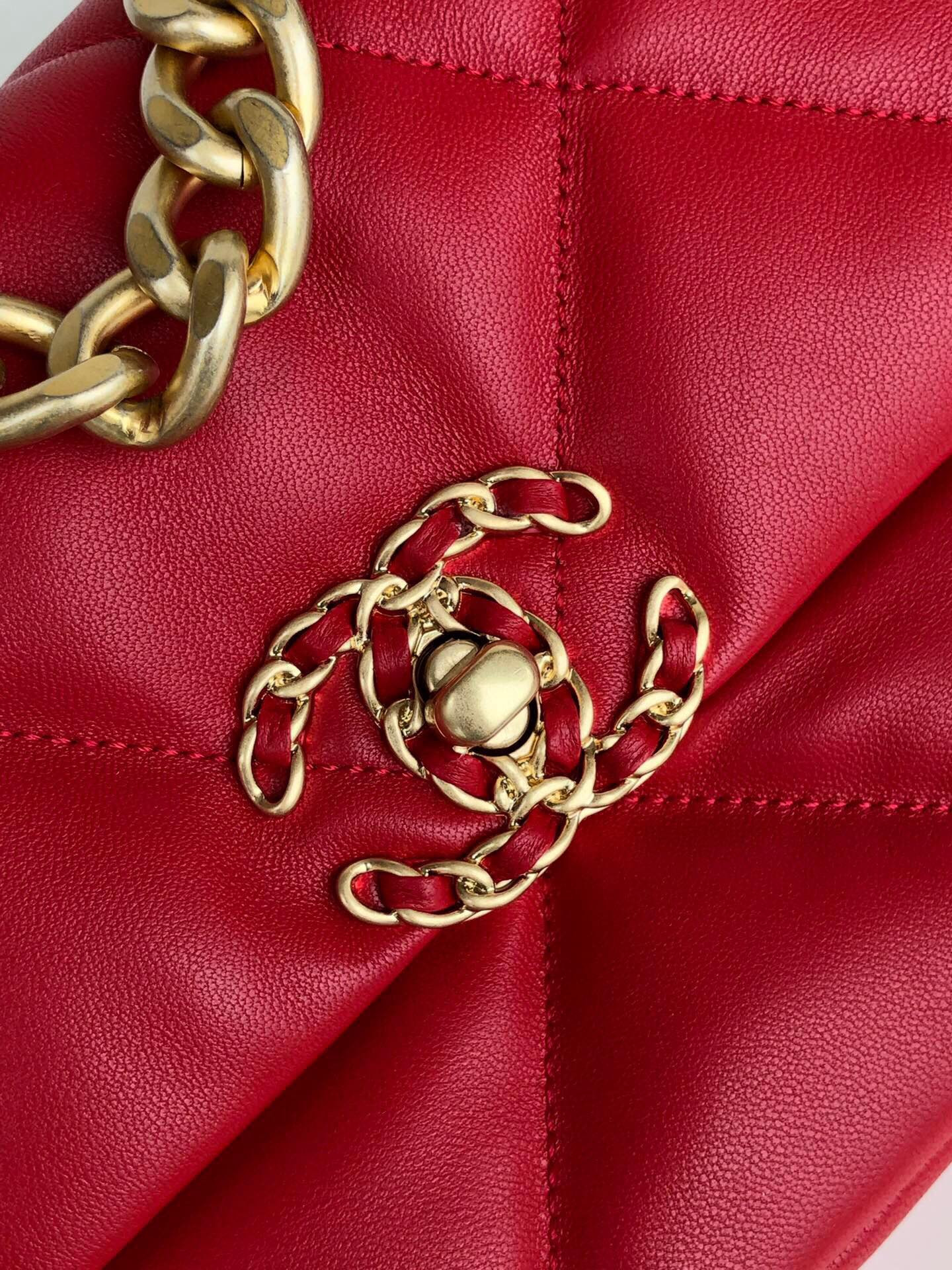 Ch*el 19 handbag shiny leather, gold-tone, silver-tone & ruthenium-finish metal red 6.2 × 10.1 × 3.5 in