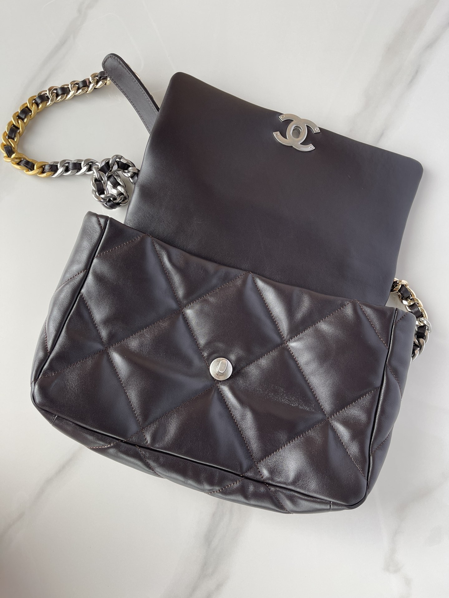 Ch*el 19 large handbag shiny leather black, gold-tone, silver-tone & ruthenium-finish metal 7.8 × 11.7 × 3.9 in