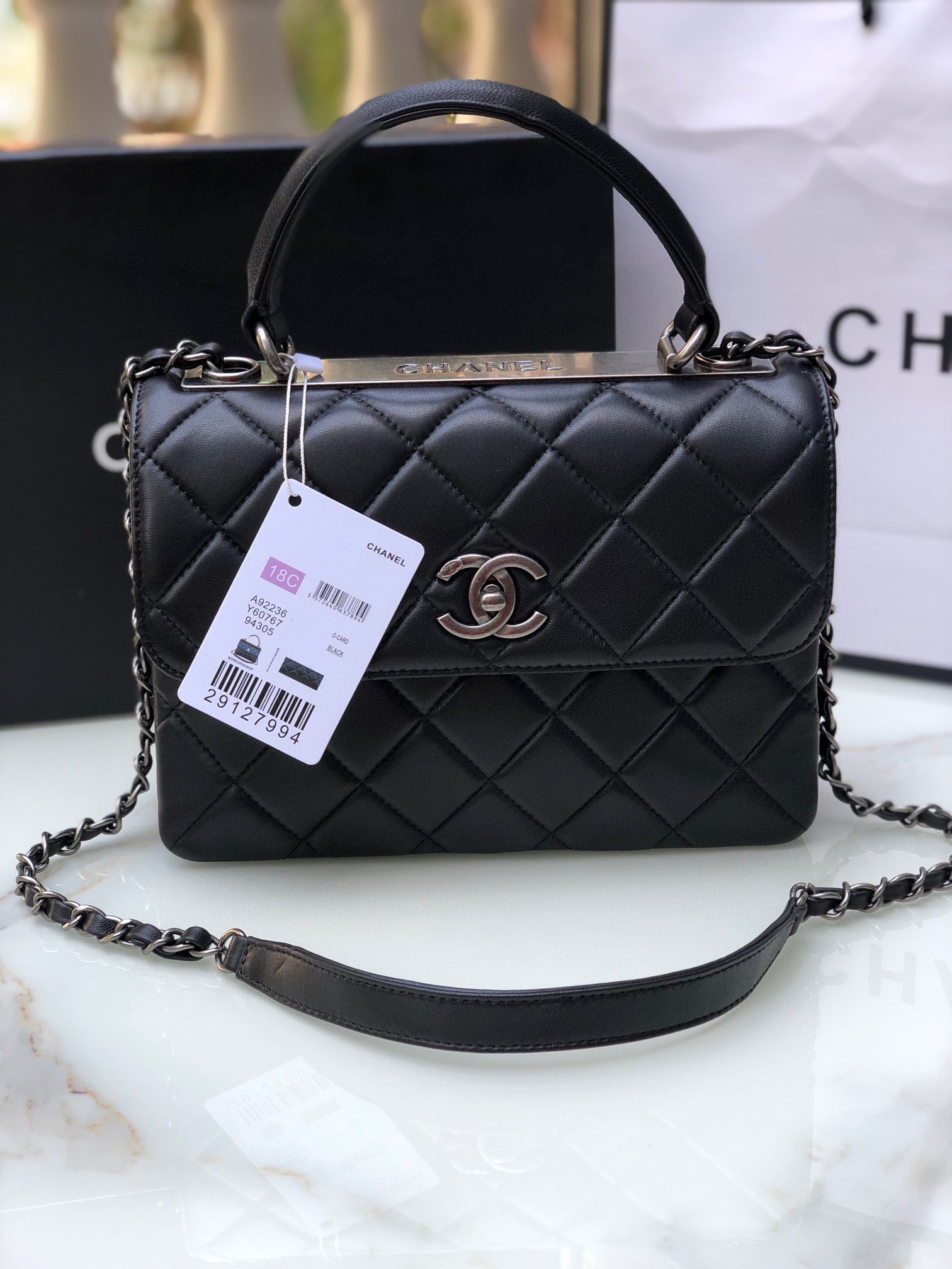 Ch*el flap bag with top handle 6.6 × 9.8 × 4.7 in