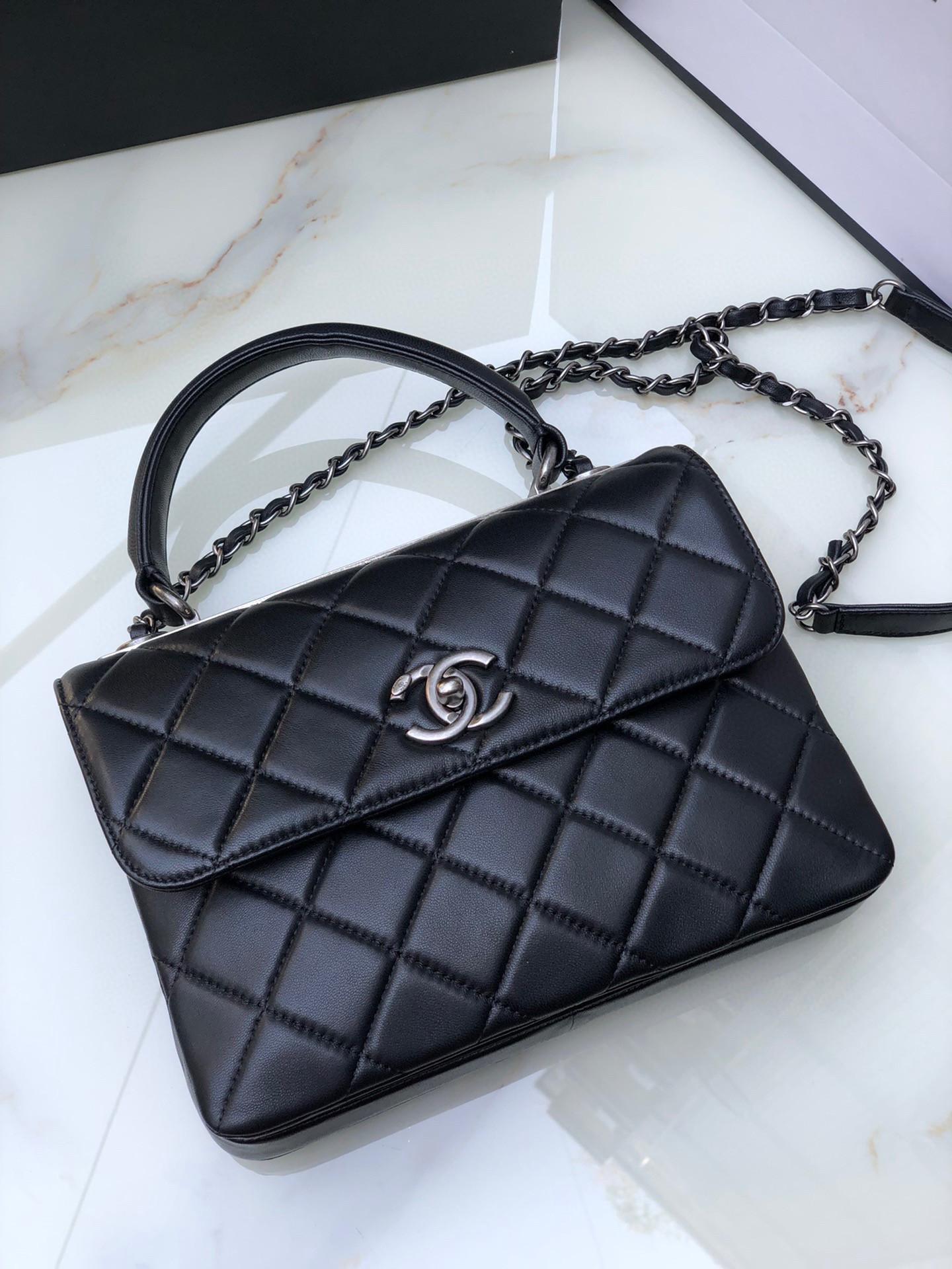 Ch*el flap bag with top handle 6.6 × 9.8 × 4.7 in