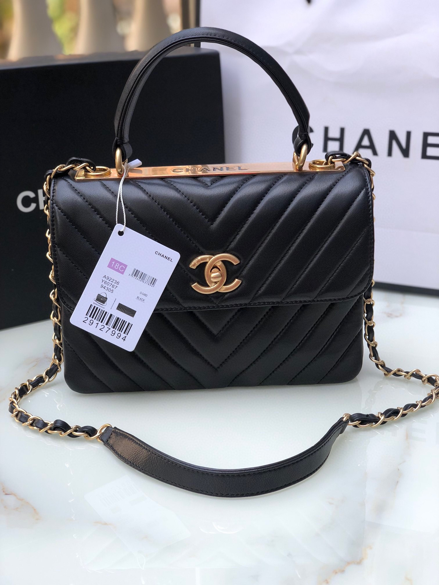 Ch*el flap bag with top handle 6.6 × 9.8 × 4.7 in