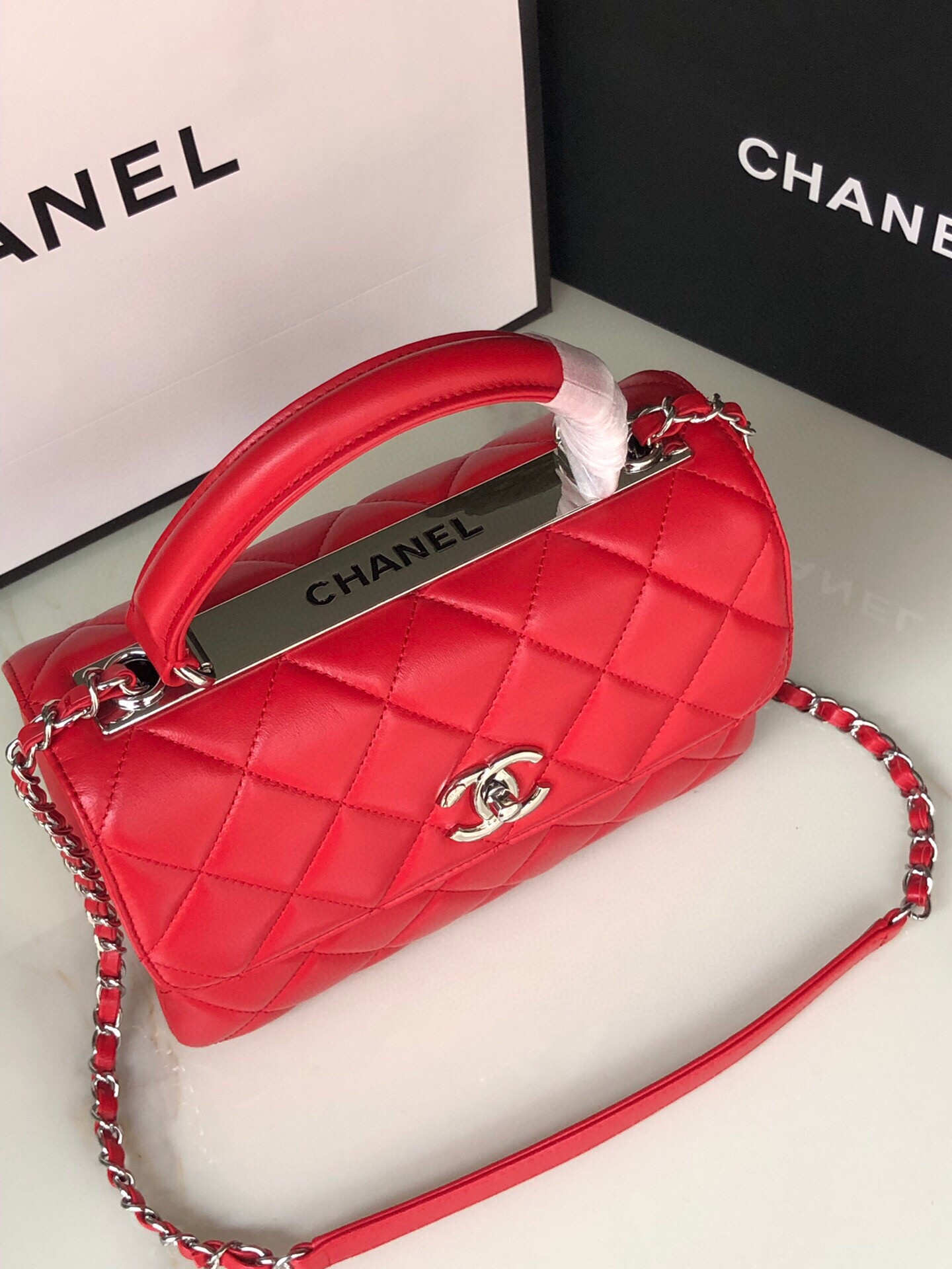 Ch*el flap bag with top handle 6.6 × 9.8 × 4.7 in
