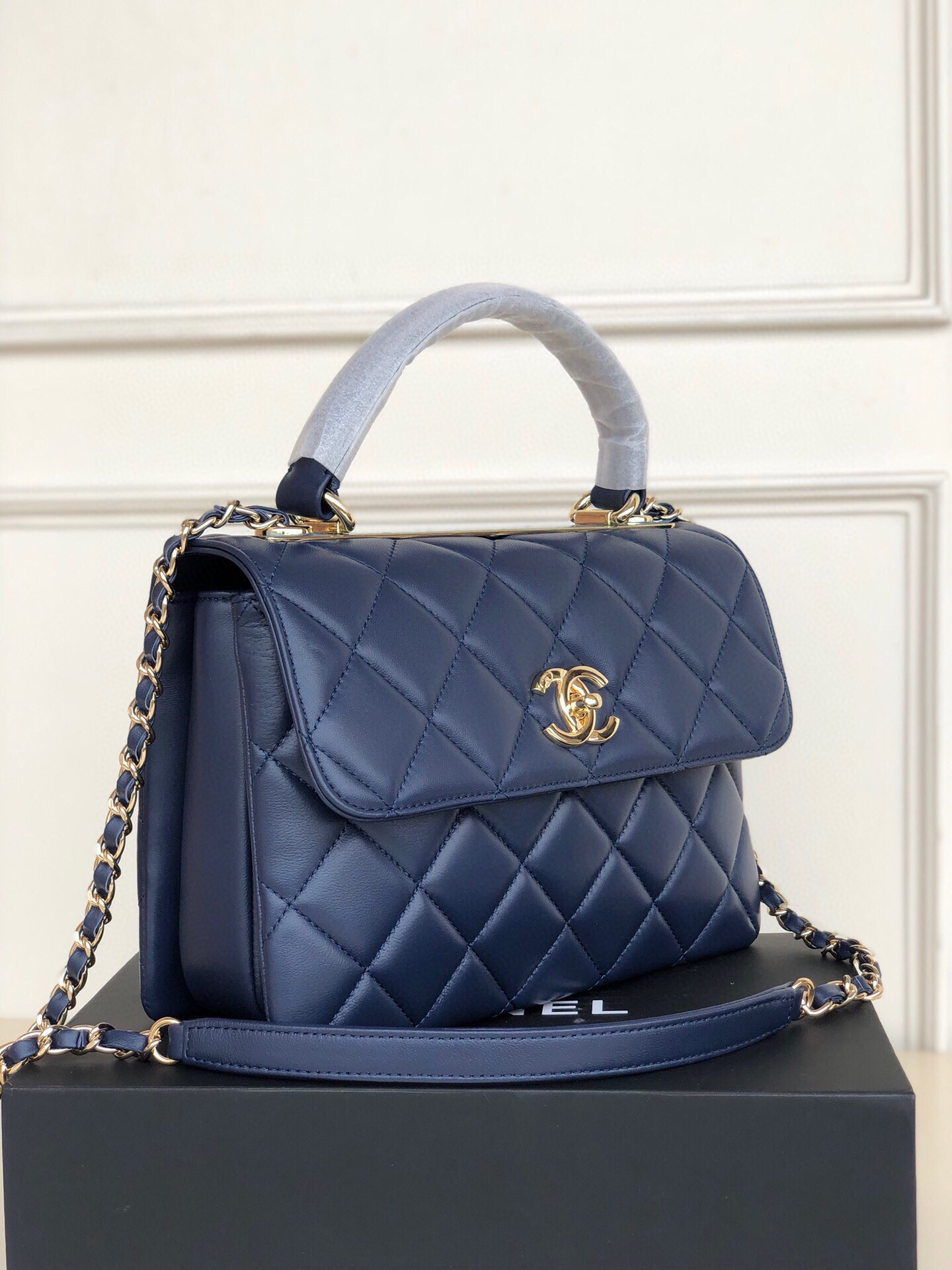 Ch*el flap bag with top handle 6.6 × 9.8 × 4.7 in