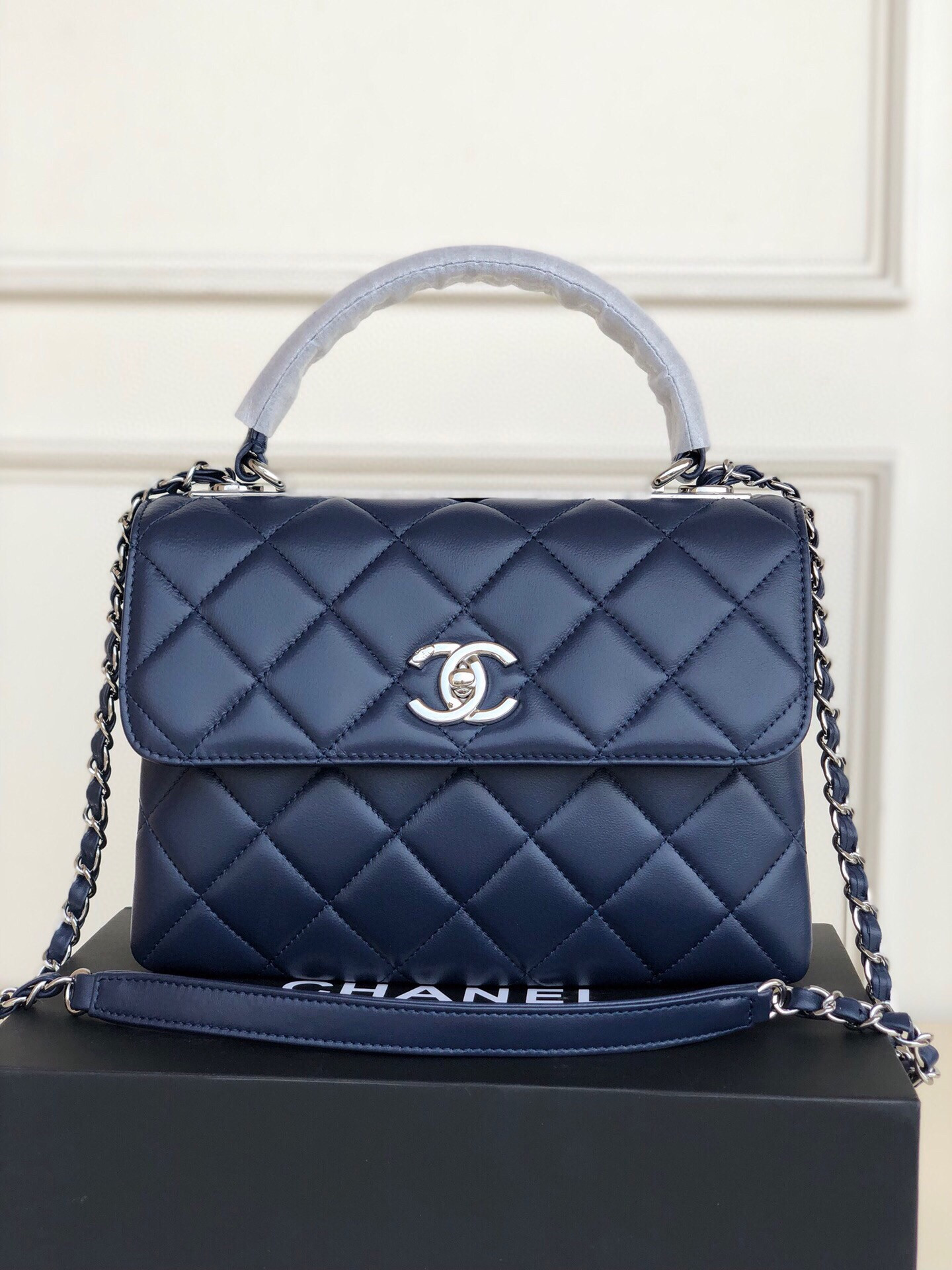 Ch*el flap bag with top handle 6.6 × 9.8 × 4.7 in