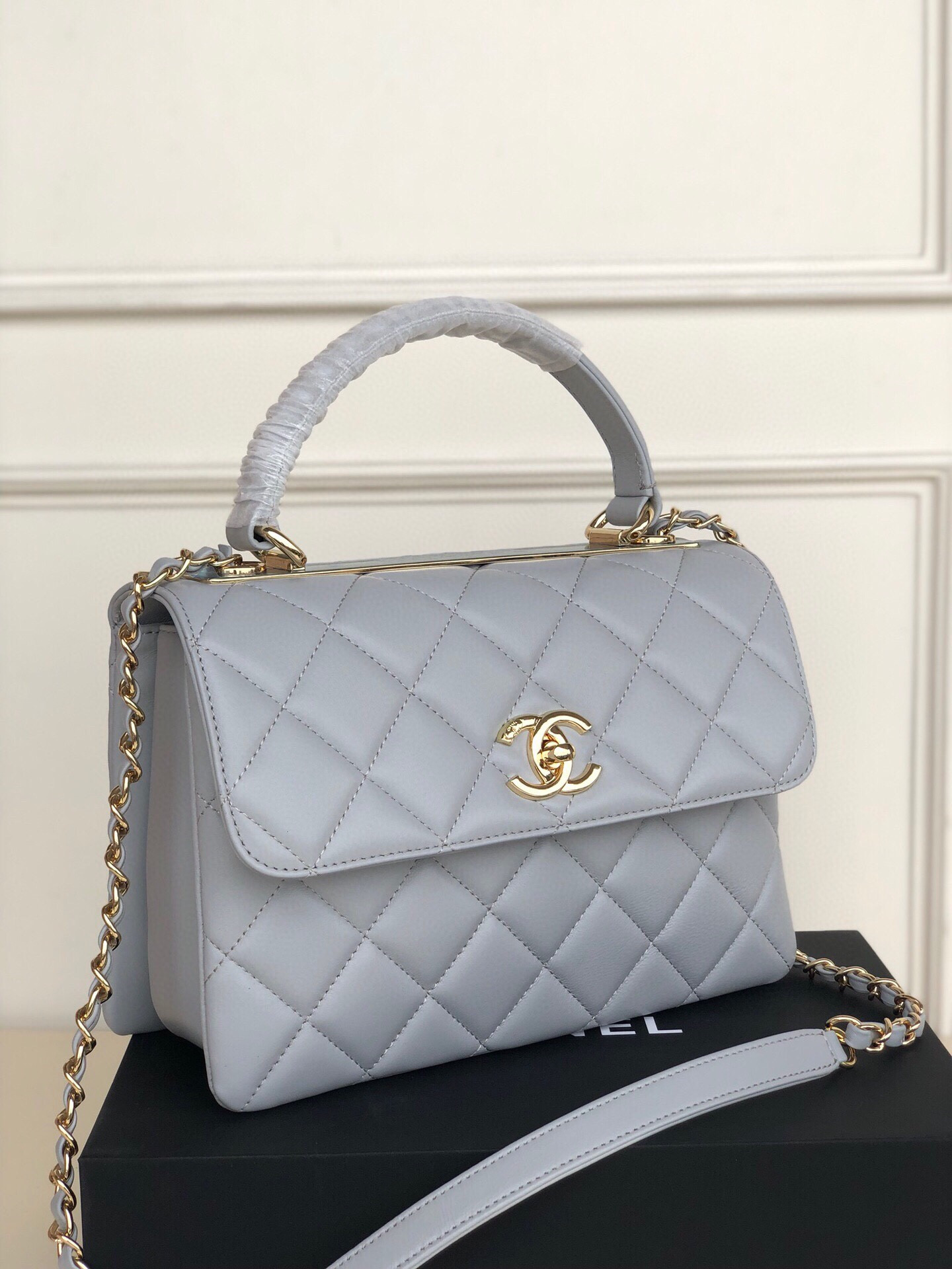 Ch*el flap bag with top handle 6.6 × 9.8 × 4.7 in