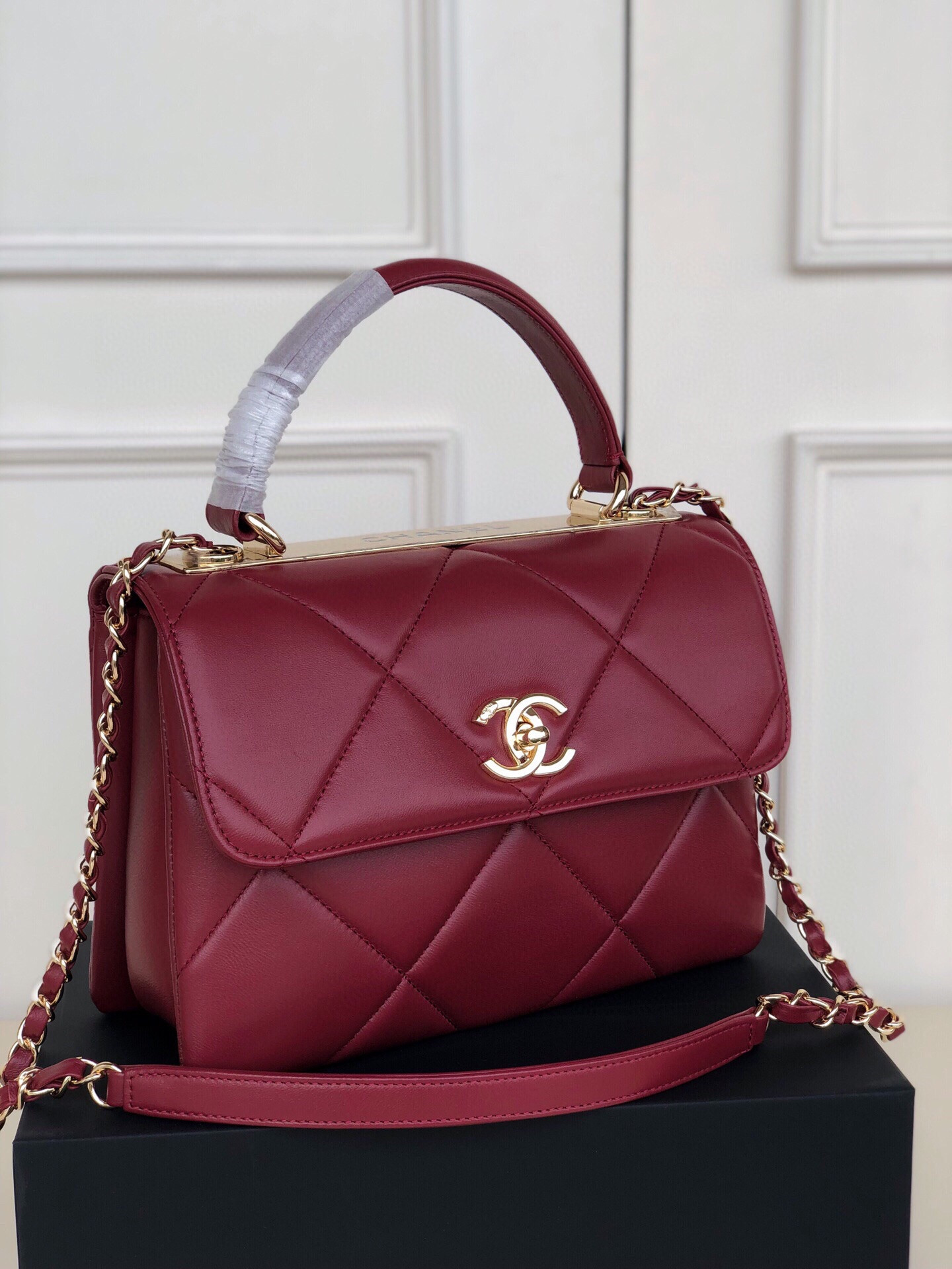 Ch*el flap bag with top handle 6.6 × 9.8 × 4.7 in