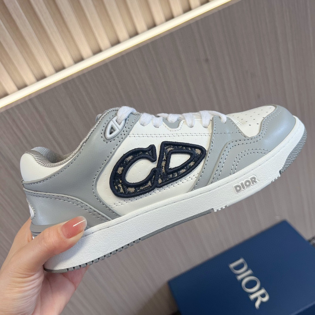 ua D*or b57 low-top sneaker  gray and white