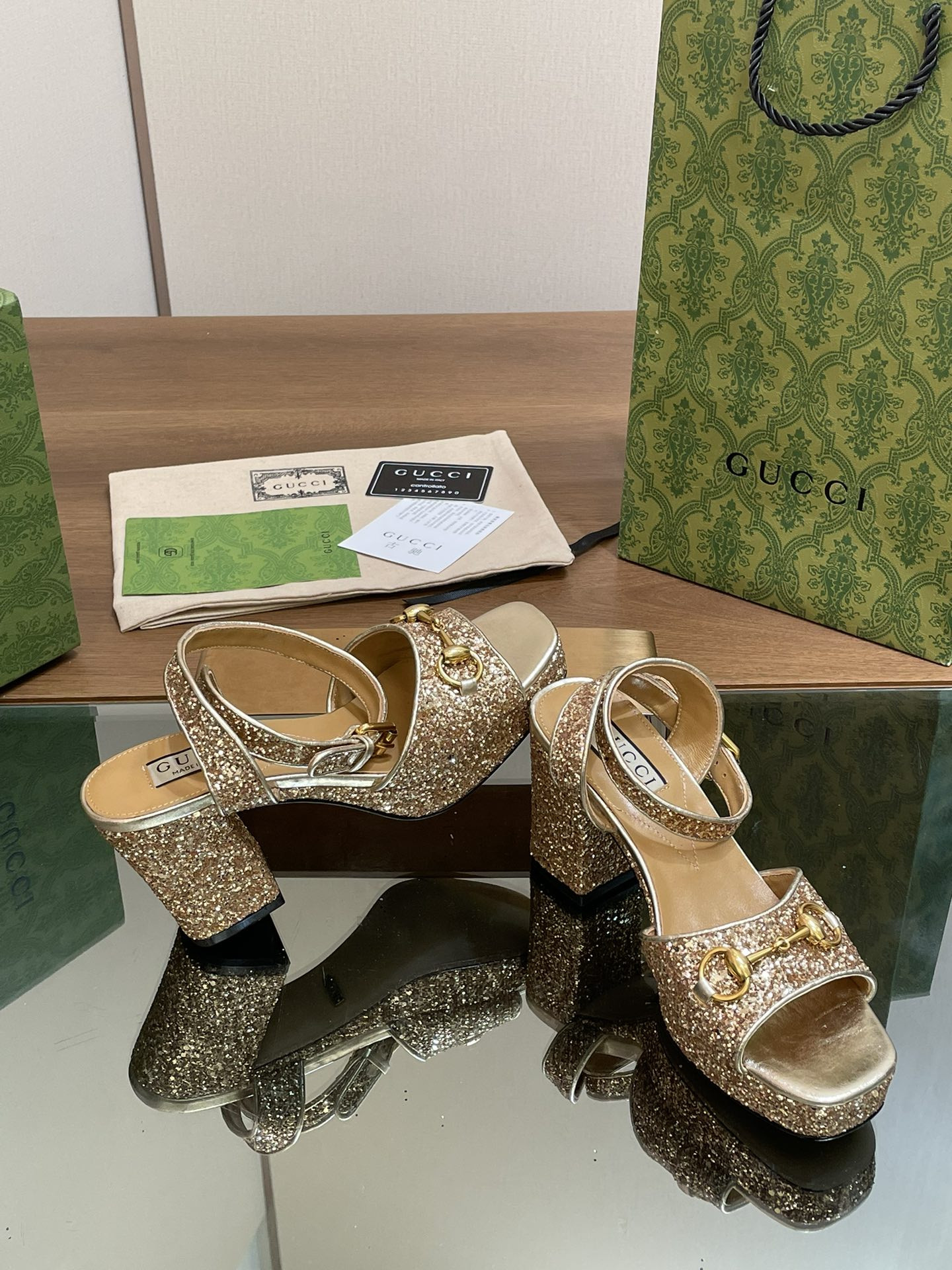 ua G*u*i horsebit platform sandal