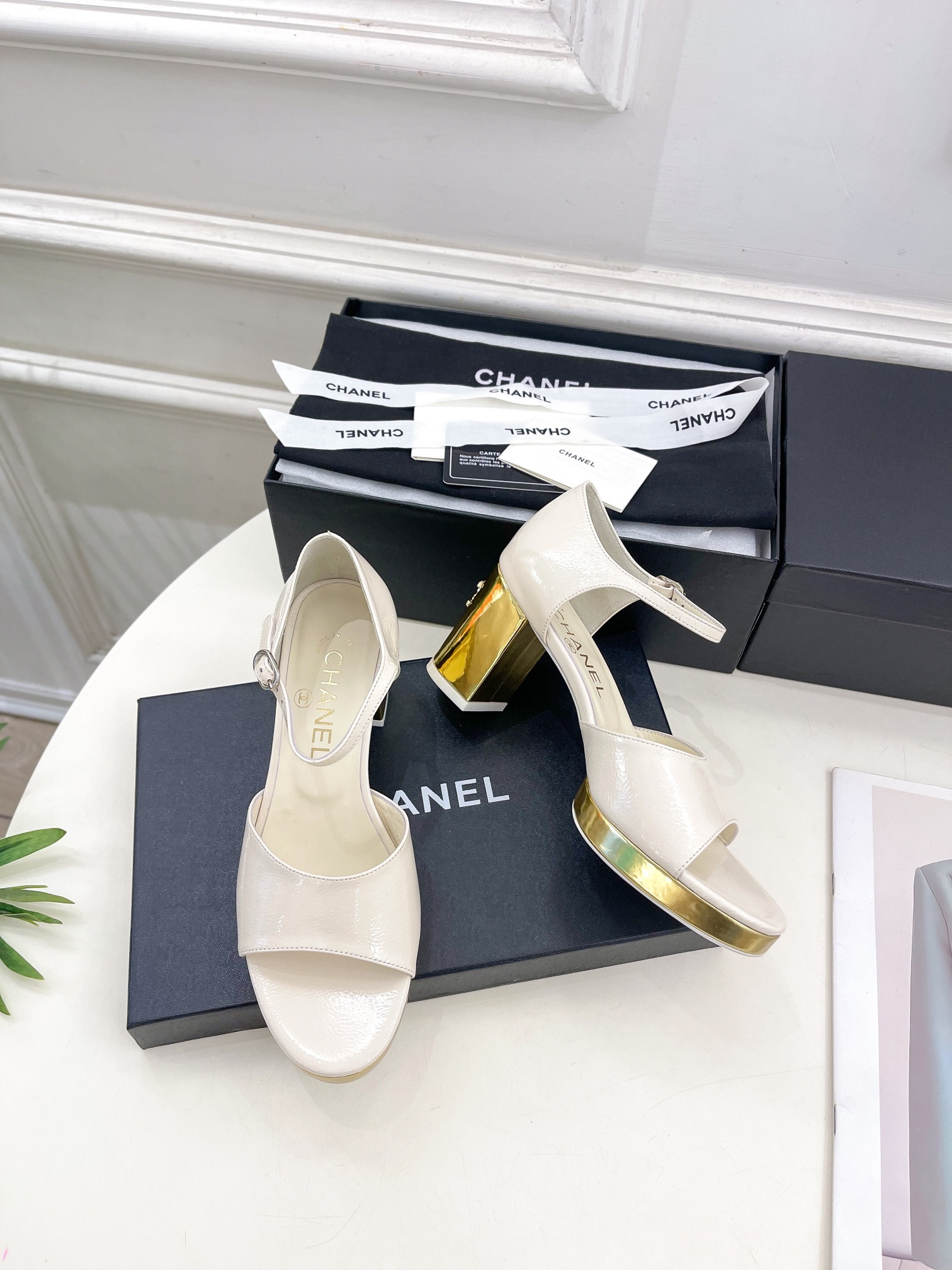 ua Ch*el heeled sandals