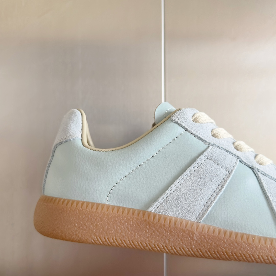 ua ma*s*n Ma*i*la mm6 sneakers