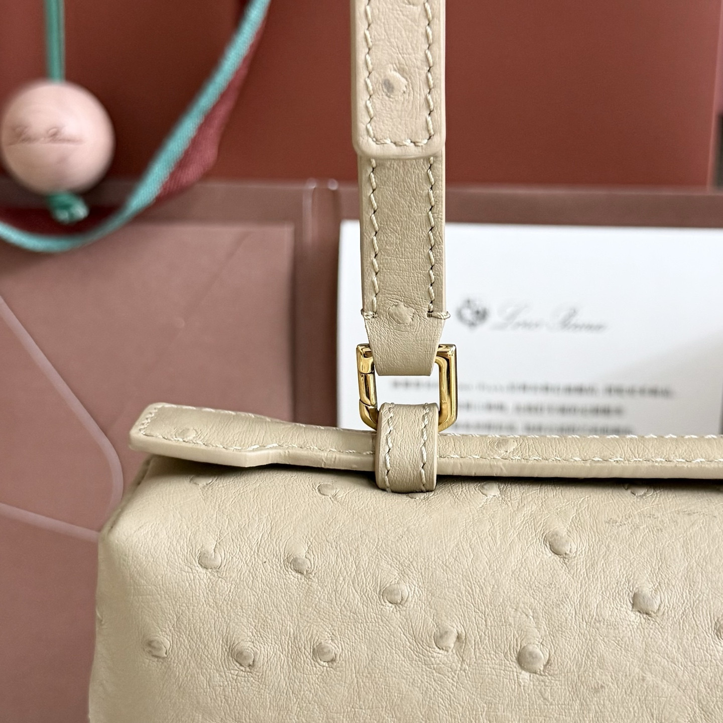 L**o p*ana extra pocket l27 ostrich-grained leather 16x27x10cm