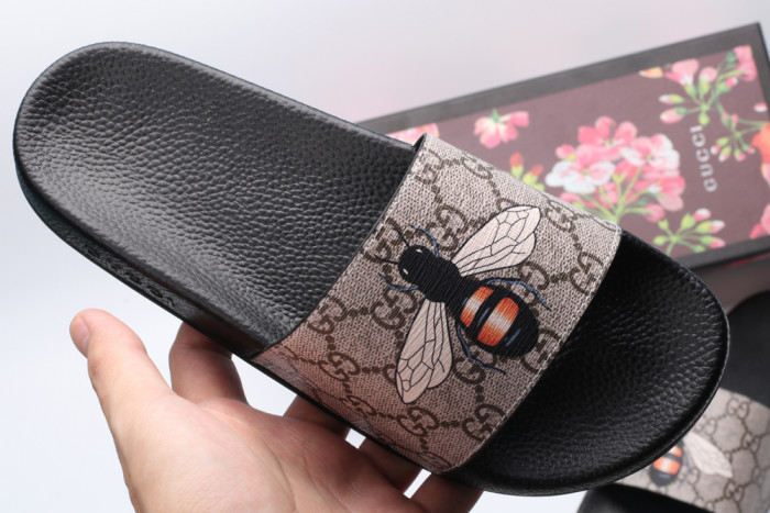 G*u*i slippers