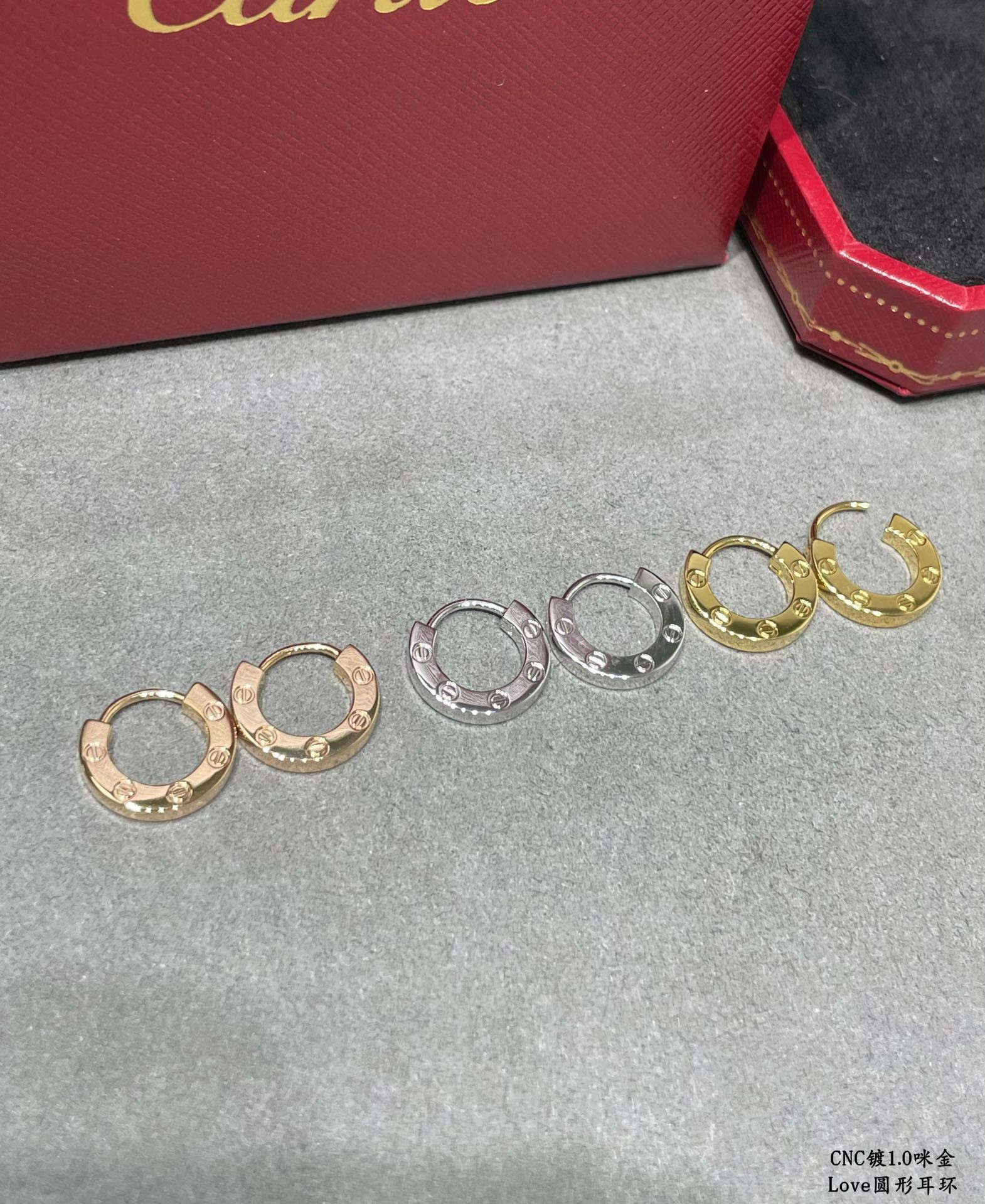 Ca*t1er LOVE glossy round earrings