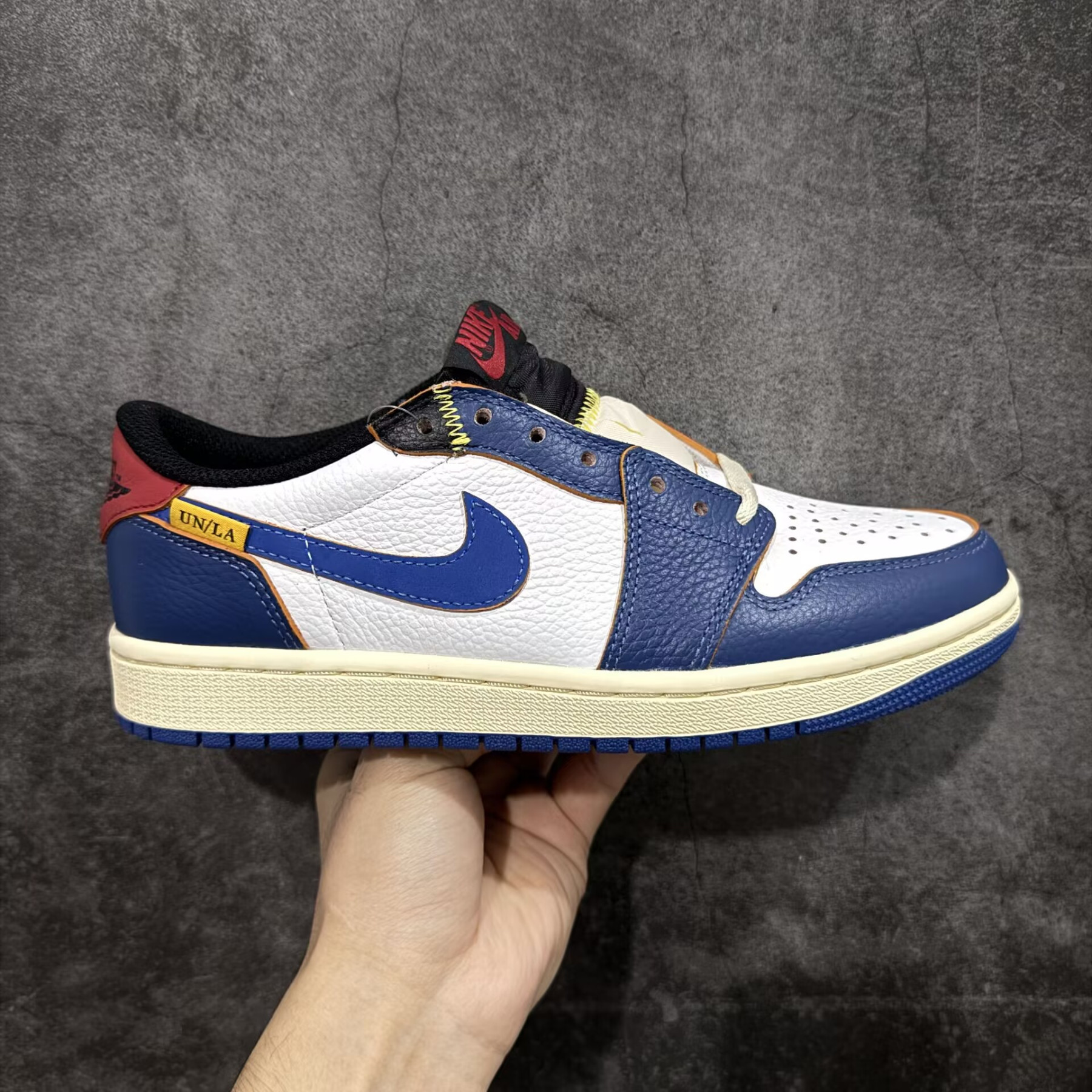 UA Air Jordan 1 Retro Low OG Storm Blue