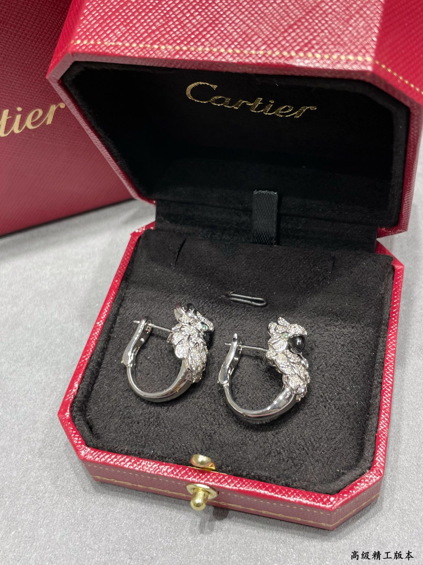 Ca*t1er Parrot Earrings