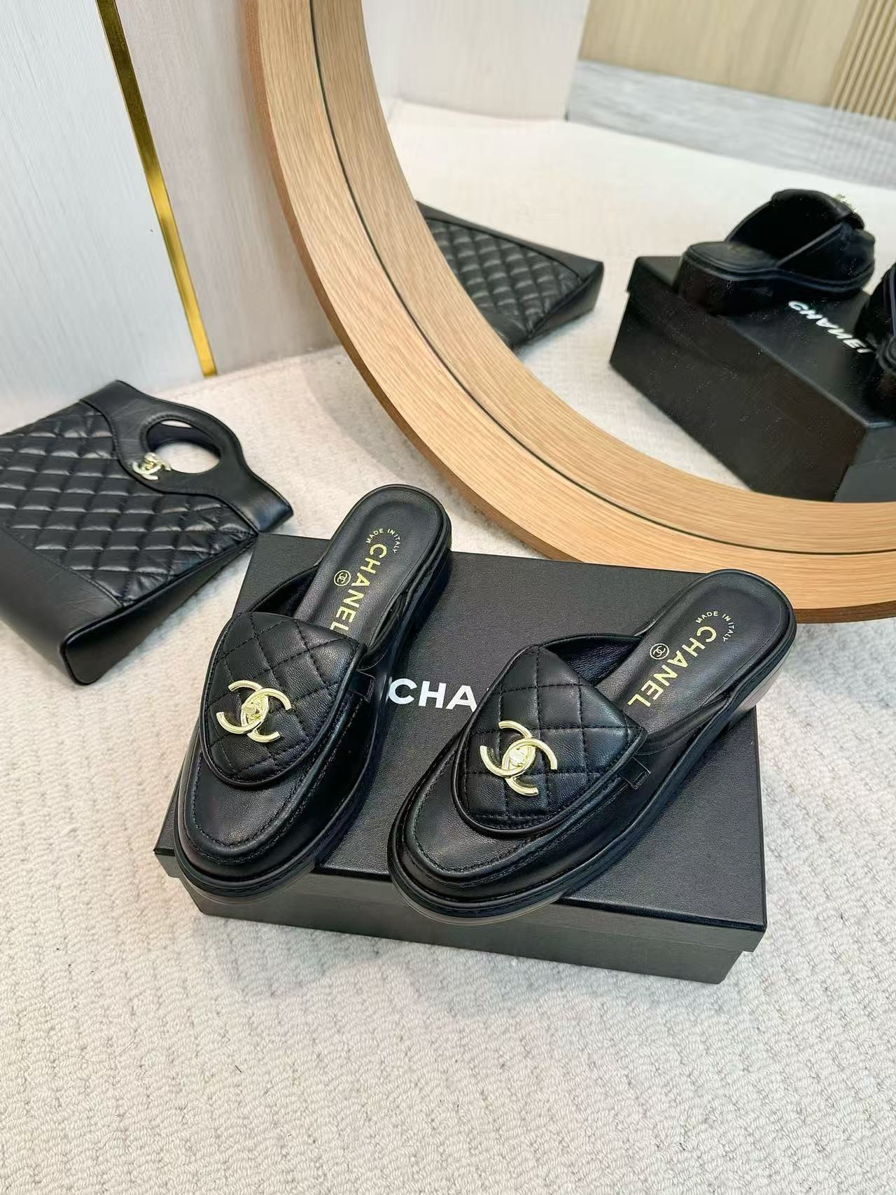 UA Ch**el Slides Leather Flats
