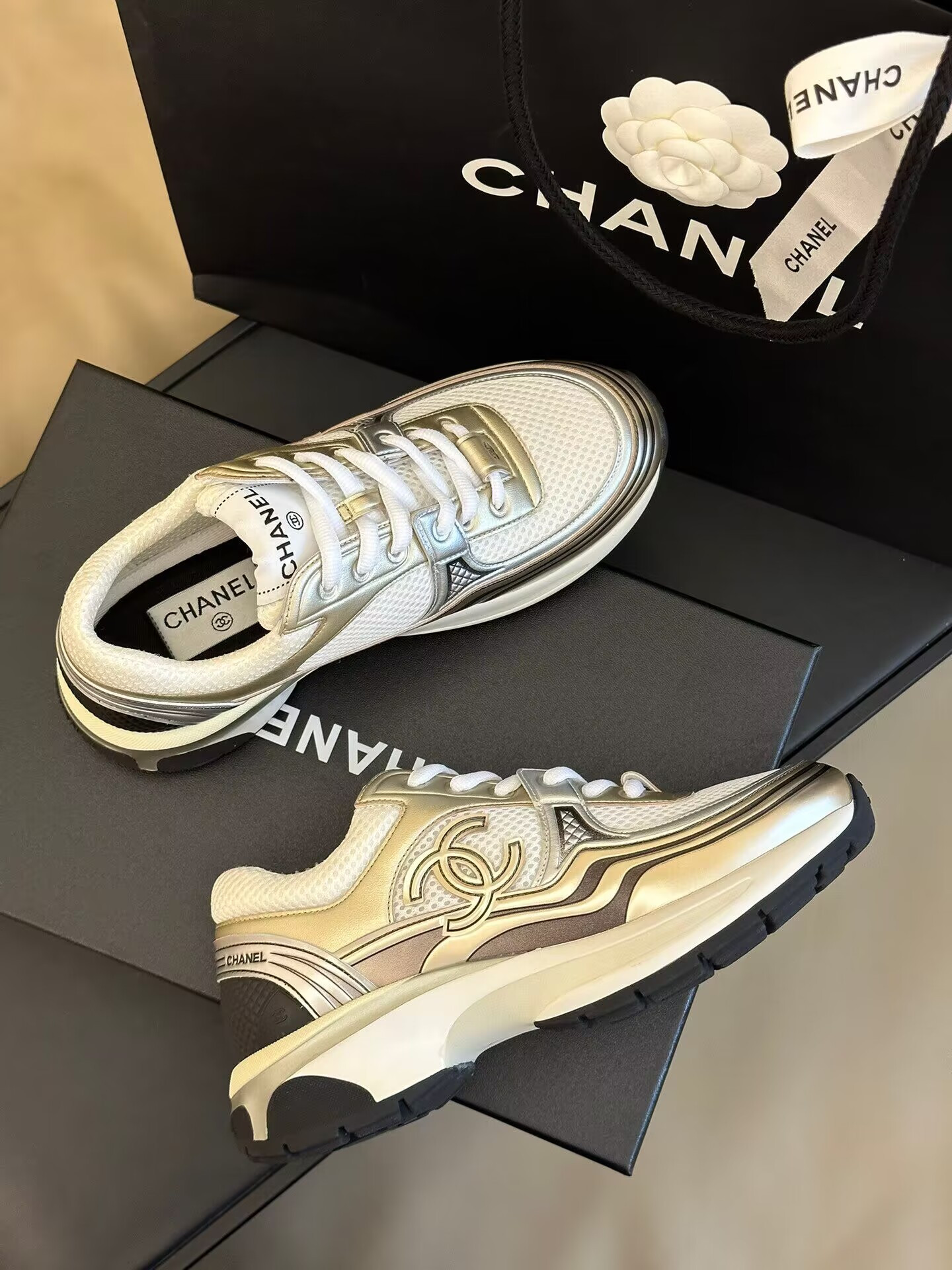 Ch**el CC Runner Gold Laminate