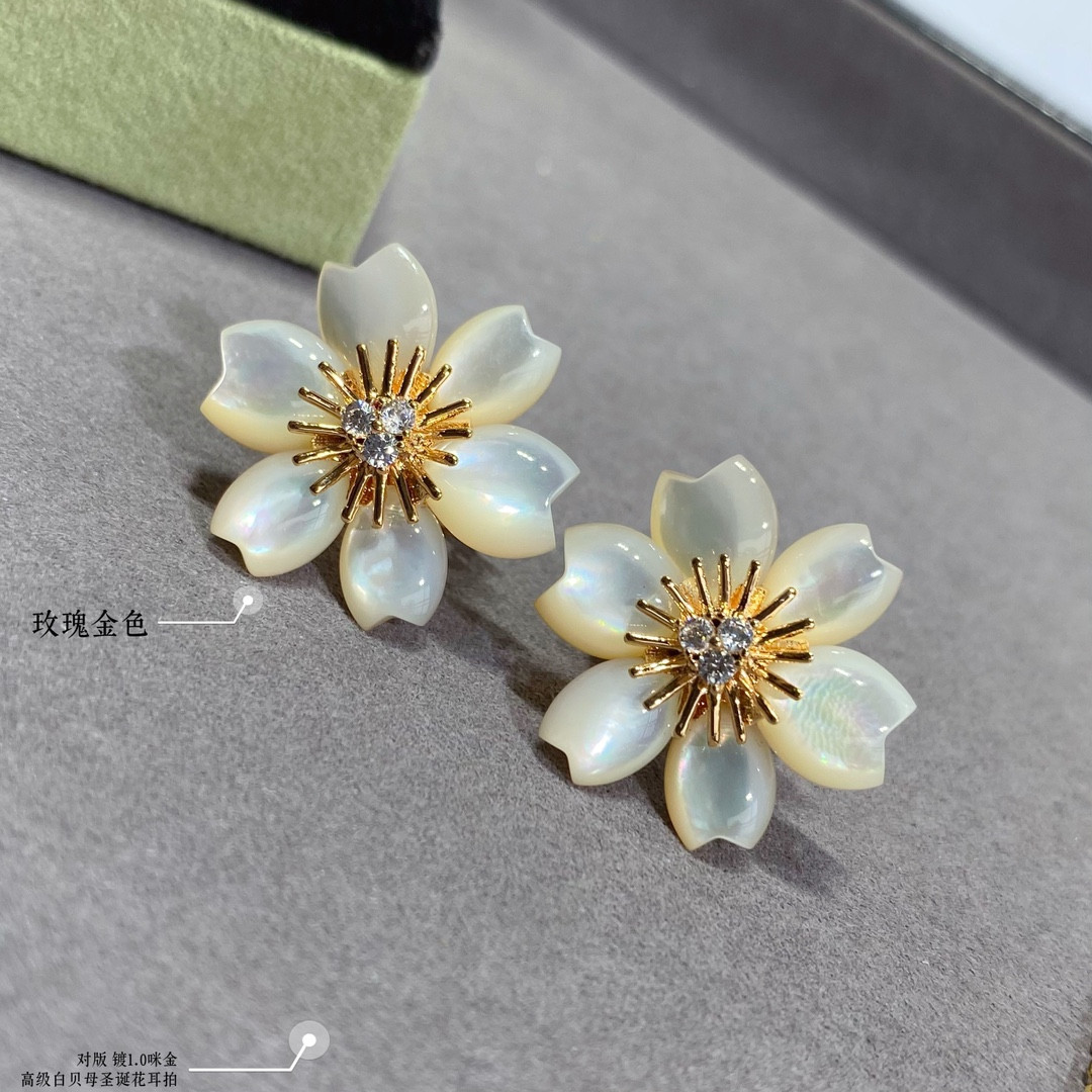 V*n Cl**f & Arpels White Mother-of-Pearl Christmas Flower Earrings