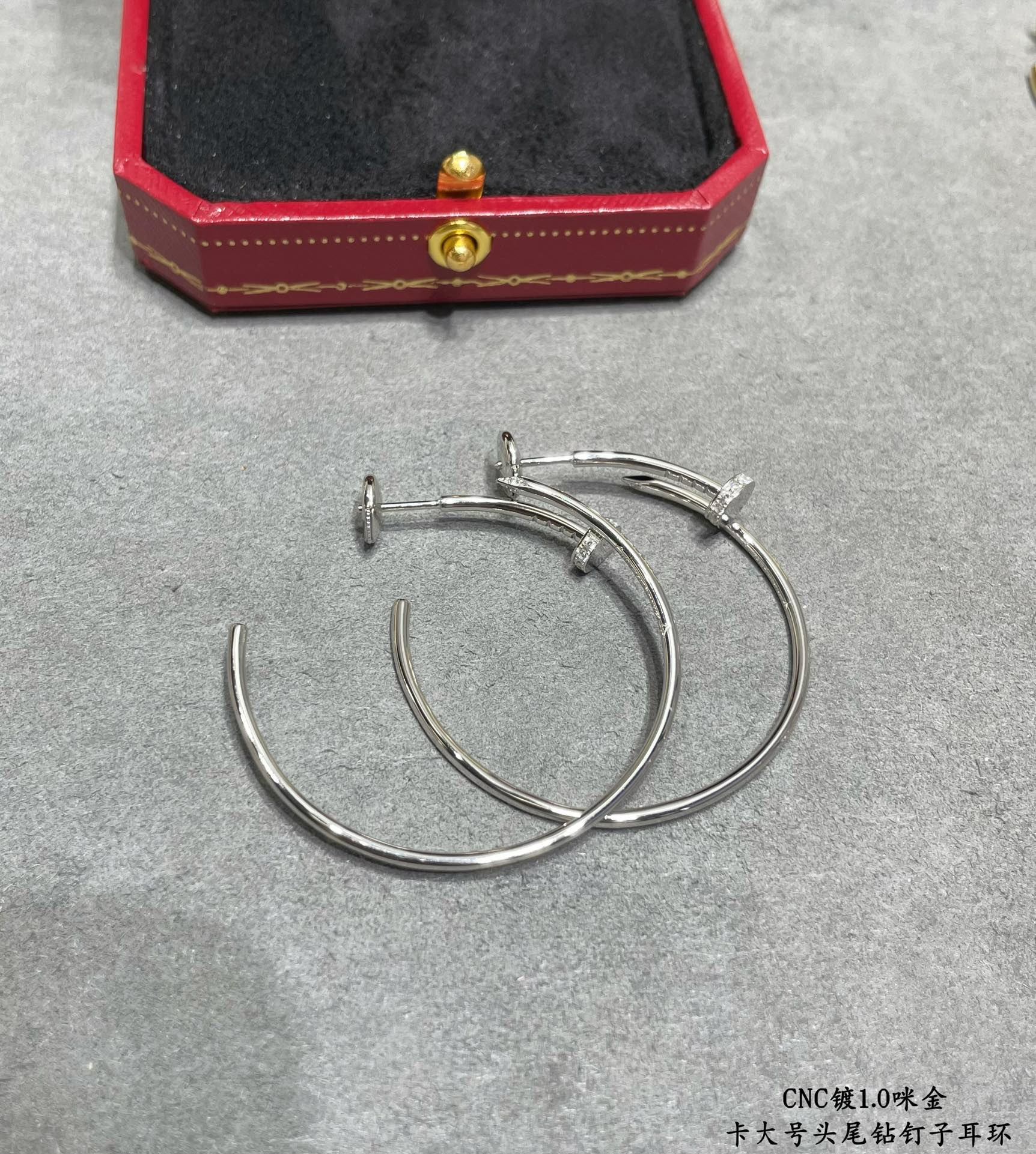 Ca*t1er Large size head and tail D1am0nd nail Earrings