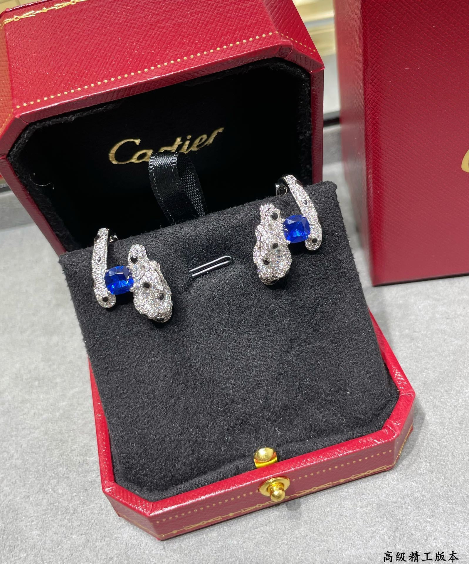 Ca*t1er Blue D1am0nd Panther Earrings