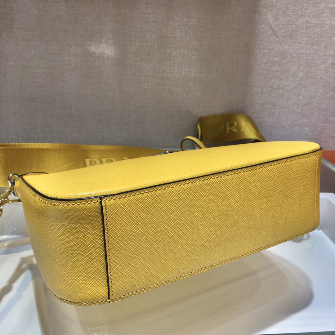 Pra*a Re-Edition 2005 Saffiano leather bag dark yellow
