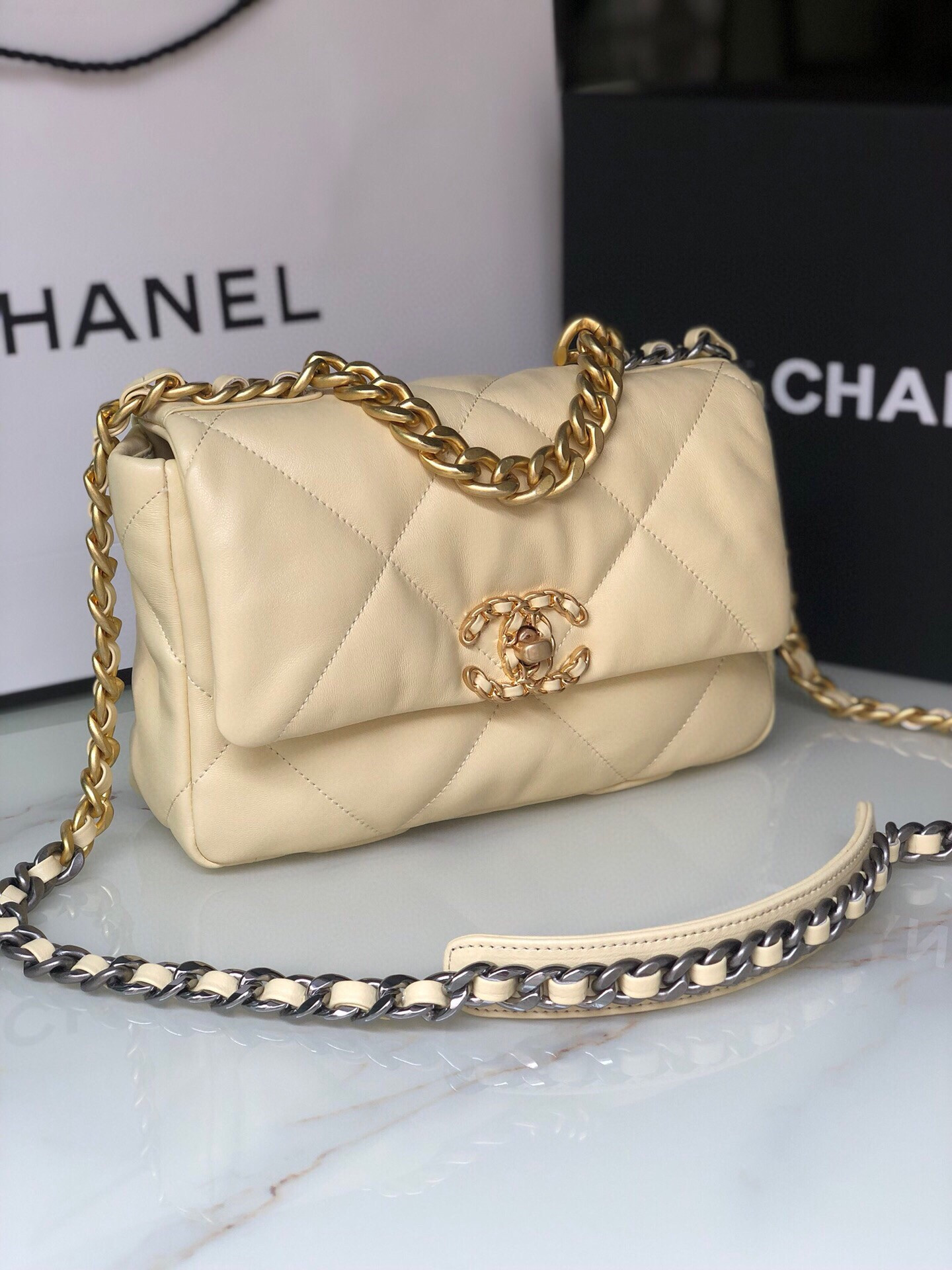 Ch**el 19 HANDBAG Shiny Leather, Gold-Tone, Silver-Tone & Ruthenium-Finish Metal Dark Yellow 6.2 × 10.1 × 3.5 in