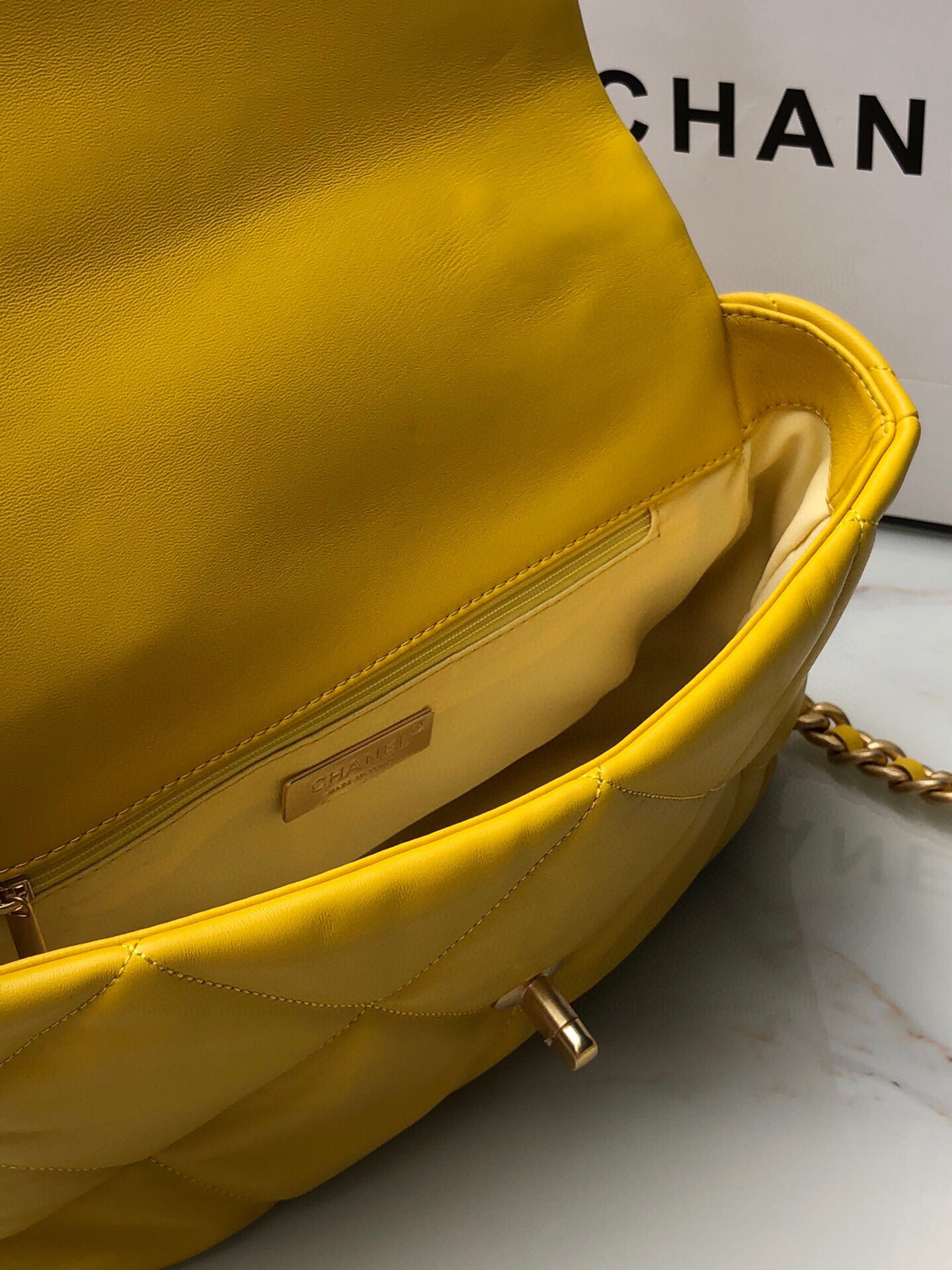 Ch**el 19 LARGE HANDBAG Shiny Leather, Gold-Tone, Silver-Tone & Ruthenium-Finish Metal Yellow 7.8 × 11.7 × 3.9 in