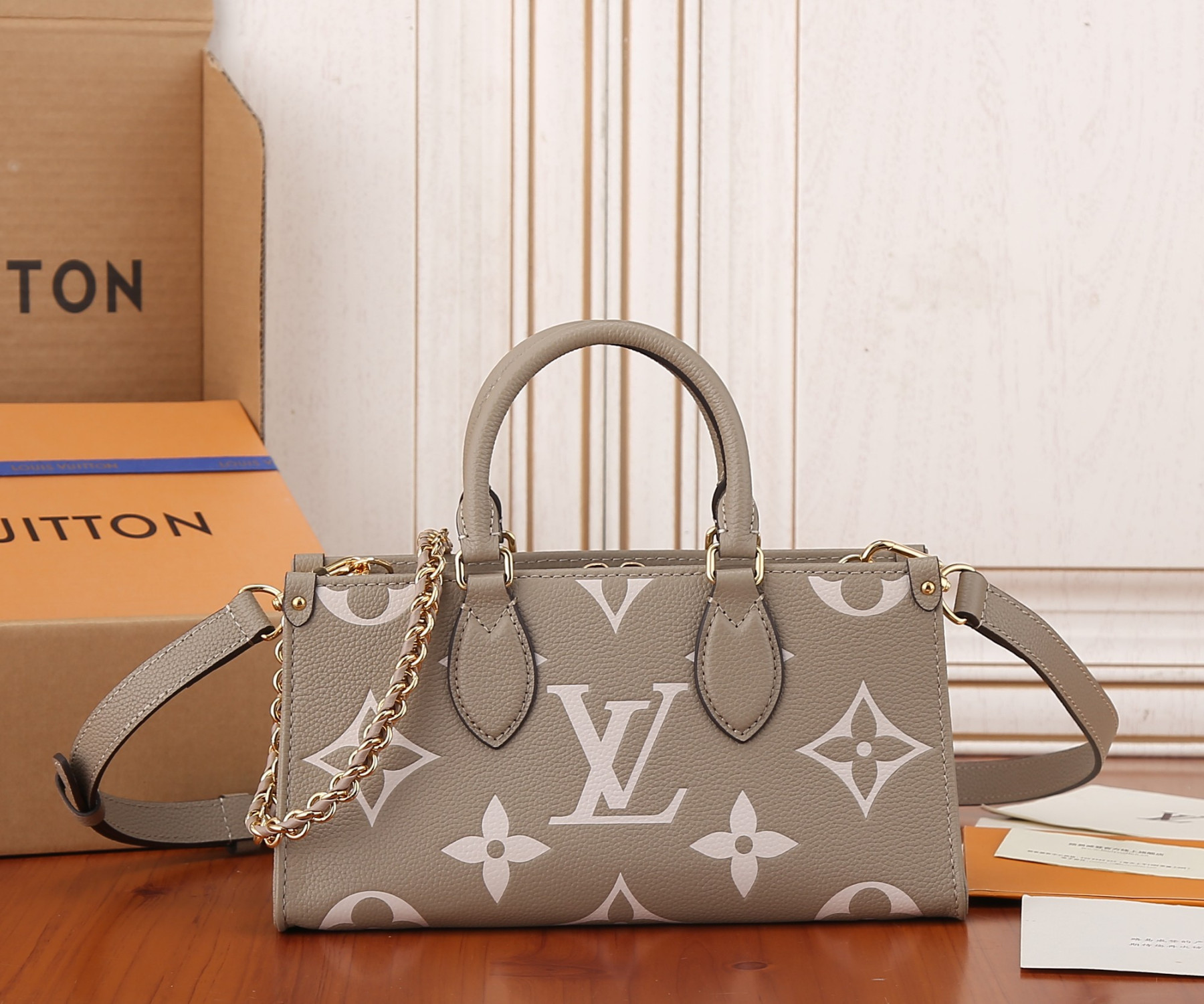LV OnTheGo East West M23641 9.8 x 5.1 x 3.9 inches