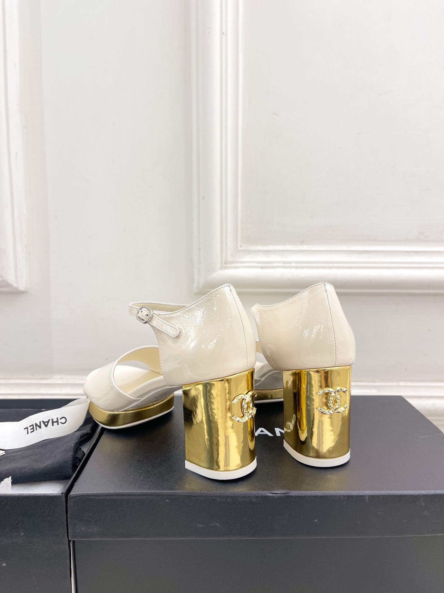 UA Ch**el HEELED SANDALS