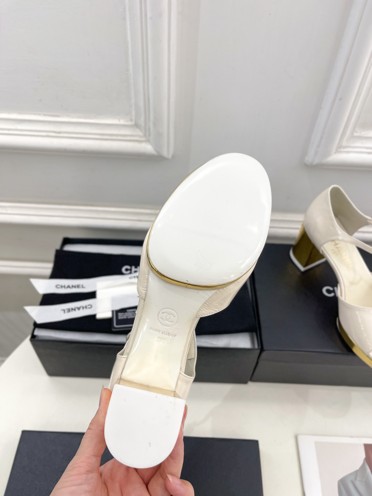 UA Ch**el HEELED SANDALS