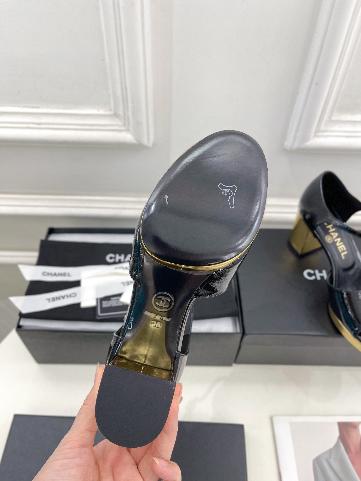 UA Ch**el HEELED SANDALS