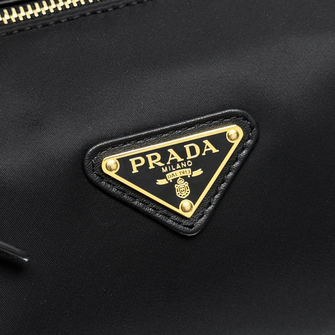 Pra*a Re-Nylon and leather medium top-handle bag with padlock 12.5x29x10cm